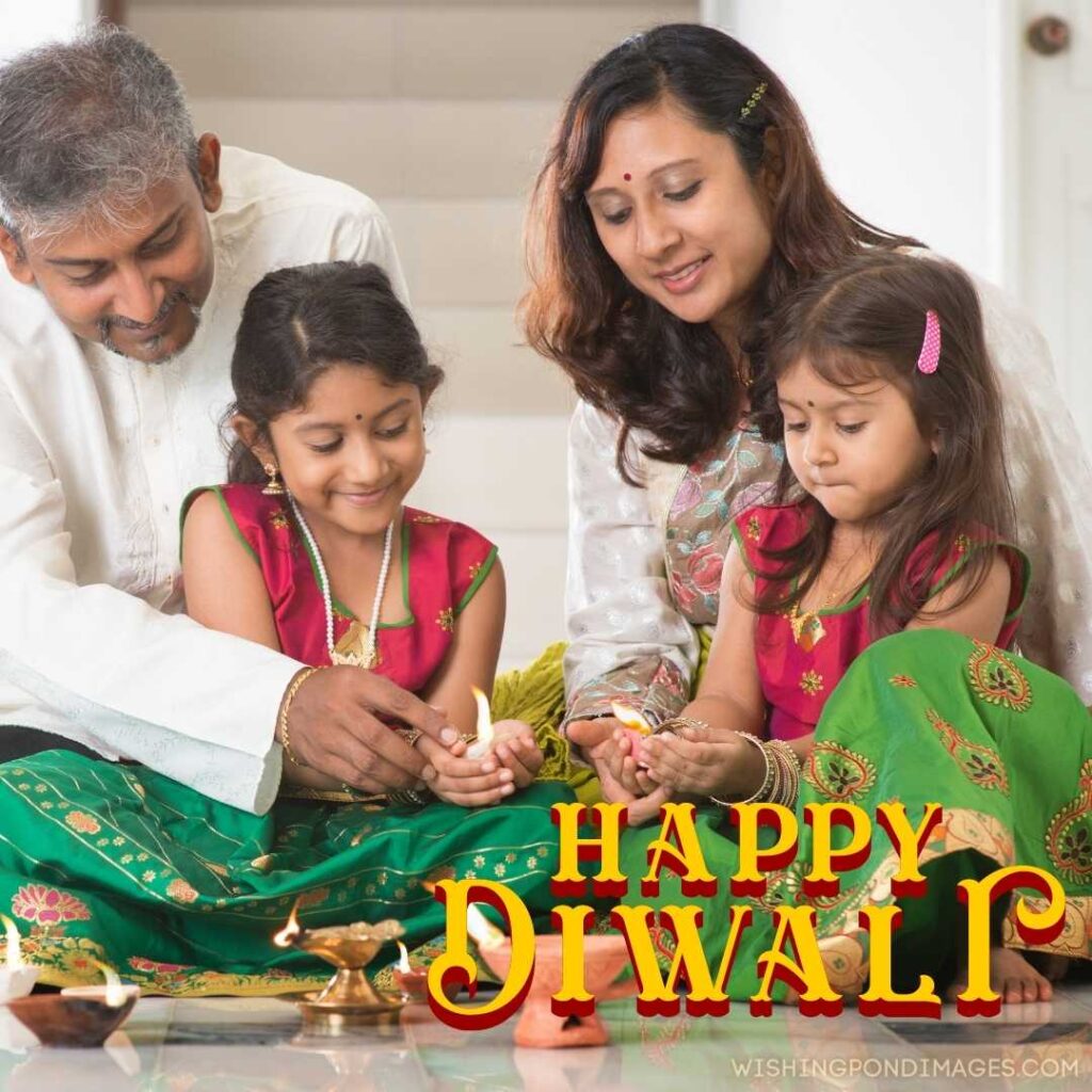 A happy family celebrating & decorating house with diyas - Happy Diwali Images