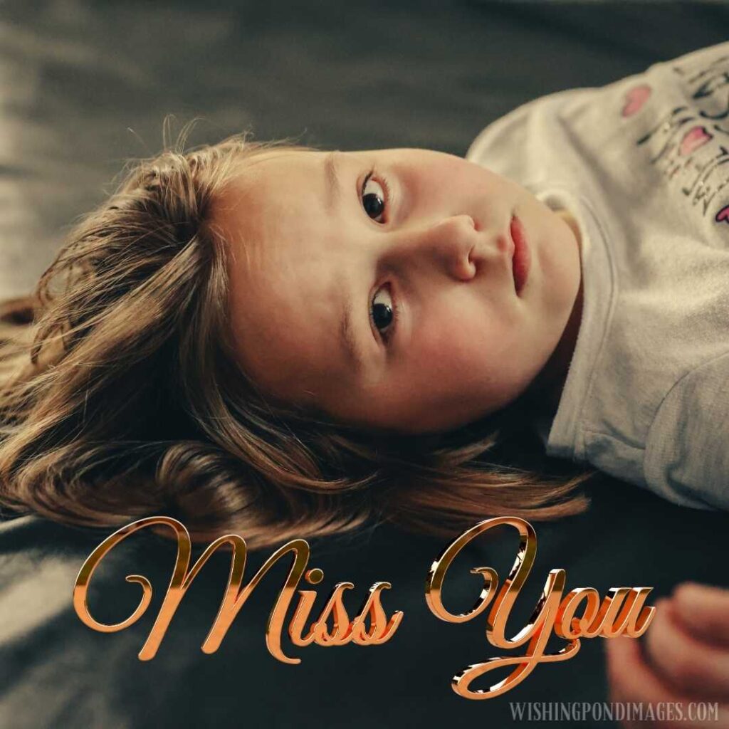 A sad girl lies on the floor in the bedroom