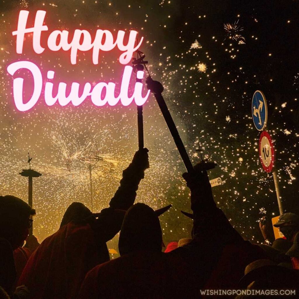 An image of people celebrating Diwali festival in open - Happy Diwali Images