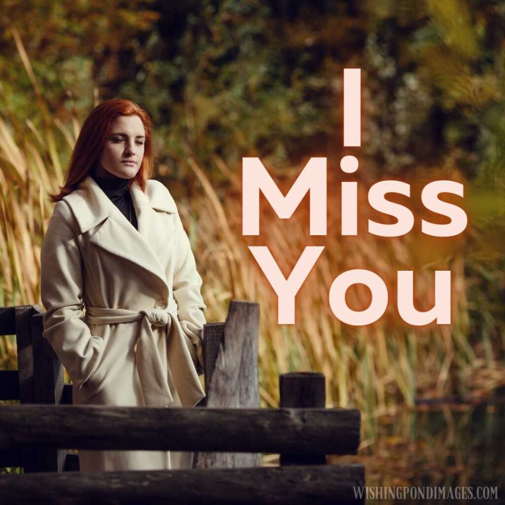 Portrait of a beautiful, dreamy and sad girl with red hair in white coat autumn