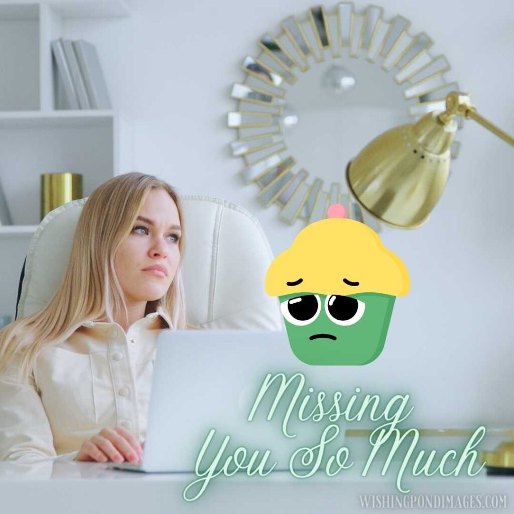 Young sad girl with laptop in a white room