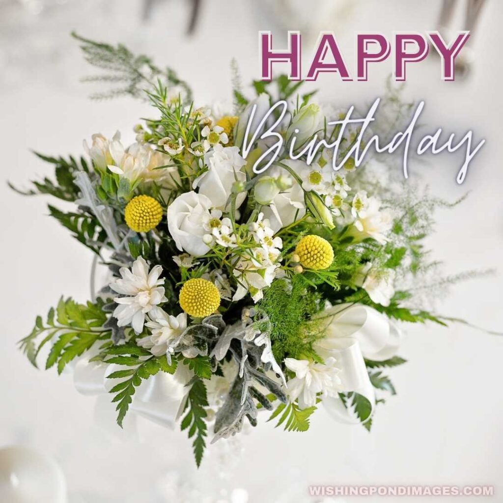 A bouquet is on the table. Happy birthday flowers images