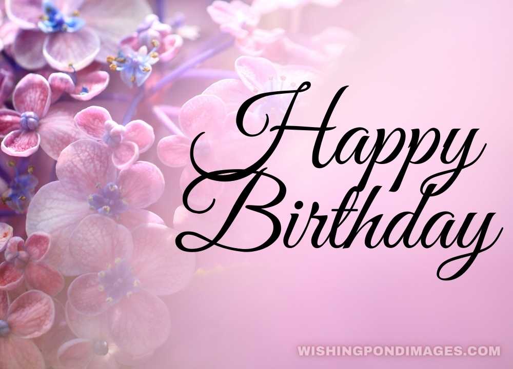 A mixture of pink and purple-colored flowers. Happy birthday flower images