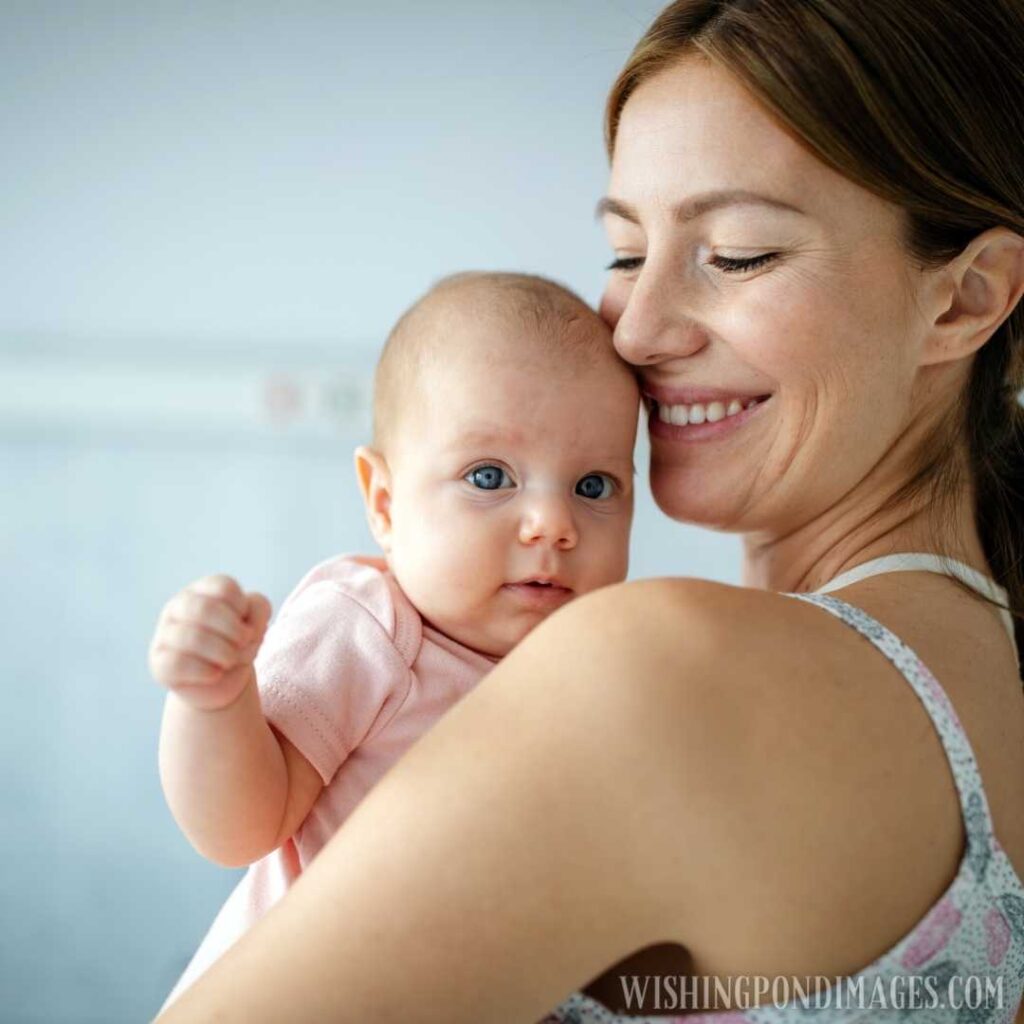 Beautiful young mother and her newborn baby together. Newborn baby image