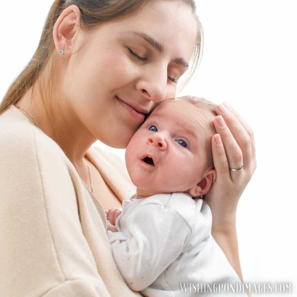 Closeup portrait of happy smiling mother holding and looking on her newborn baby boy. Newborn baby image