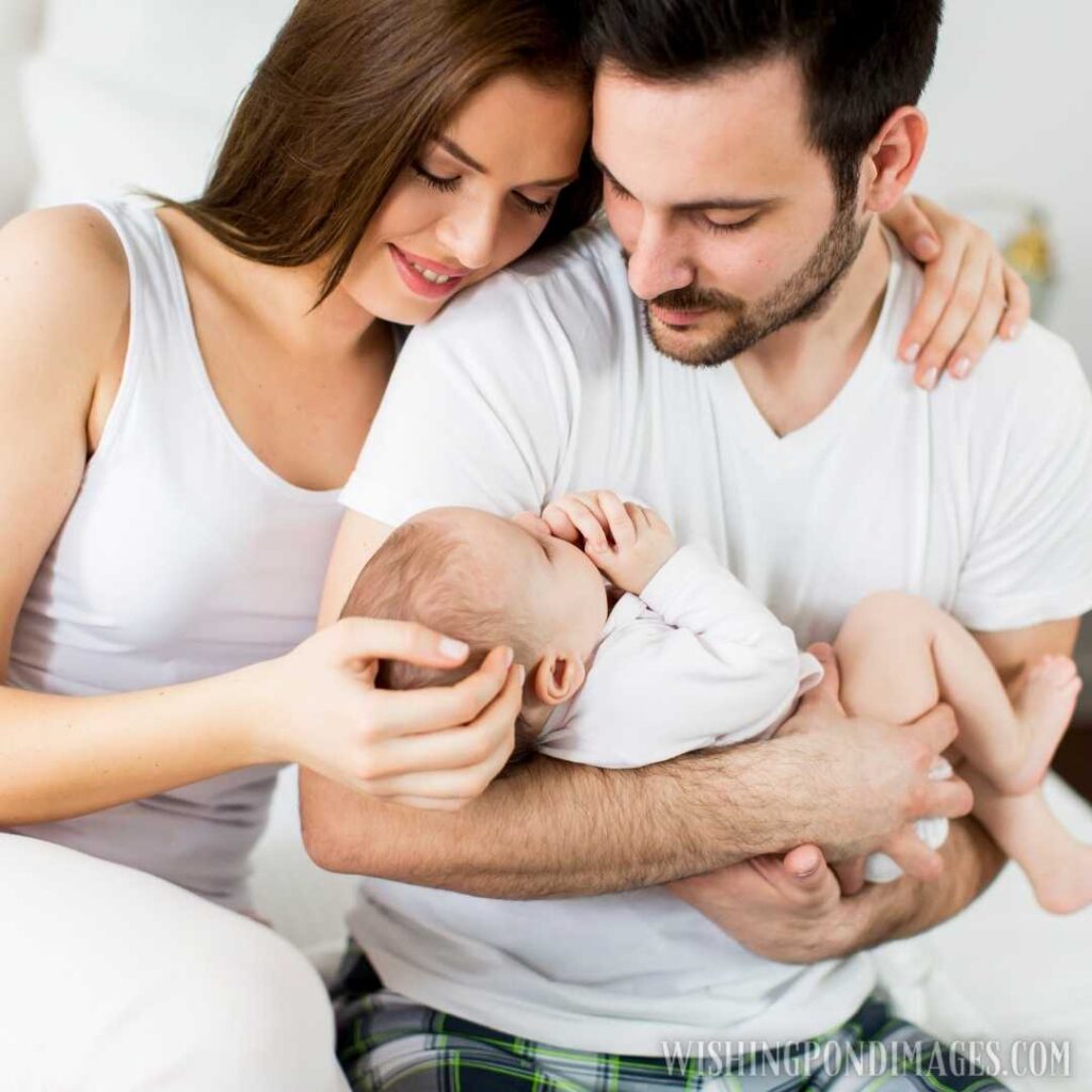 Little newborn baby holding parent's one hand. Newborn baby image