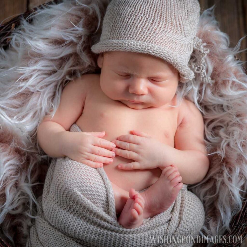 Lovely newborn baby sleeping on the blanket. Newborn baby images