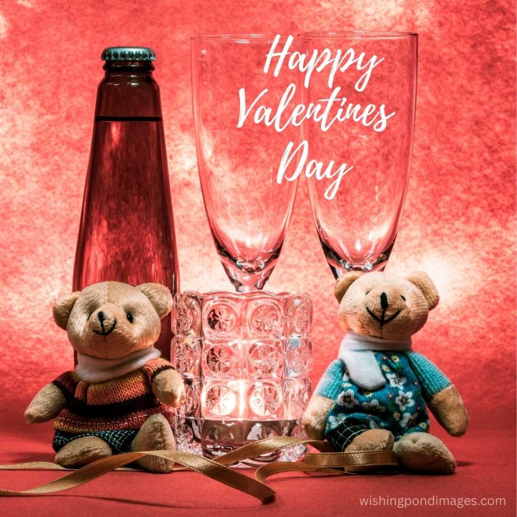 Two teddy bears with two glasses with one bottle of soft drink on the table on valentines day
