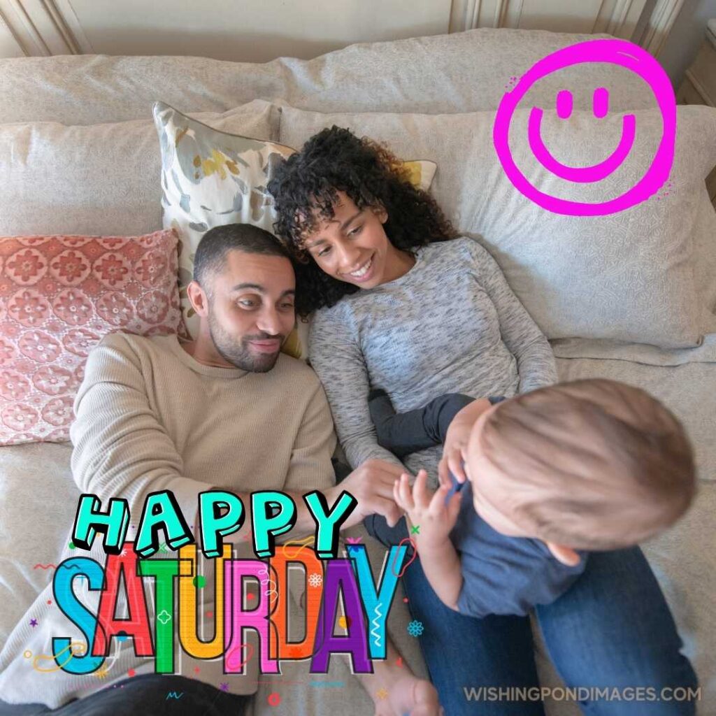 An adorable couple of African descent spends an afternoon playing with their son at home - Good morning happy Saturday