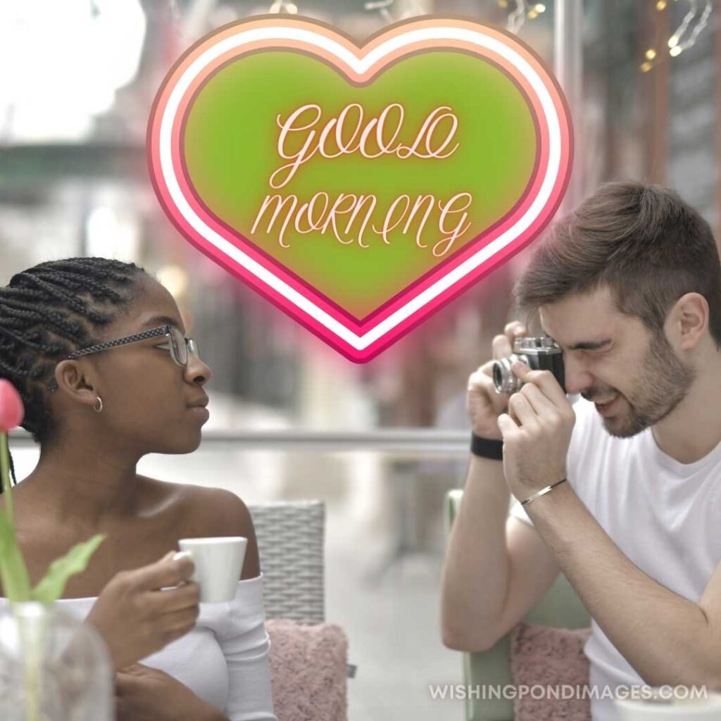 A boyfriend taking picture of girlfriend while drinking coffee. Good Morning Coffee Images