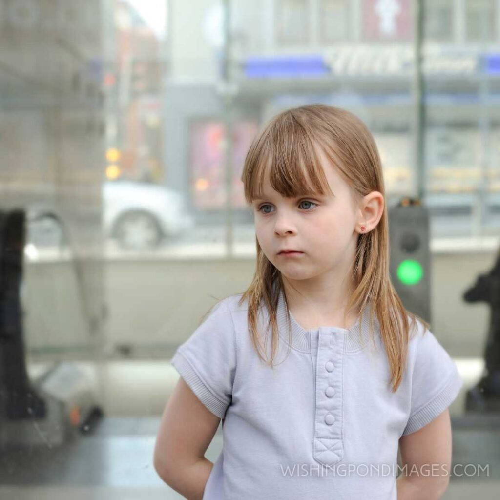 A cute little girl looking sad. Feeling alone images girl.