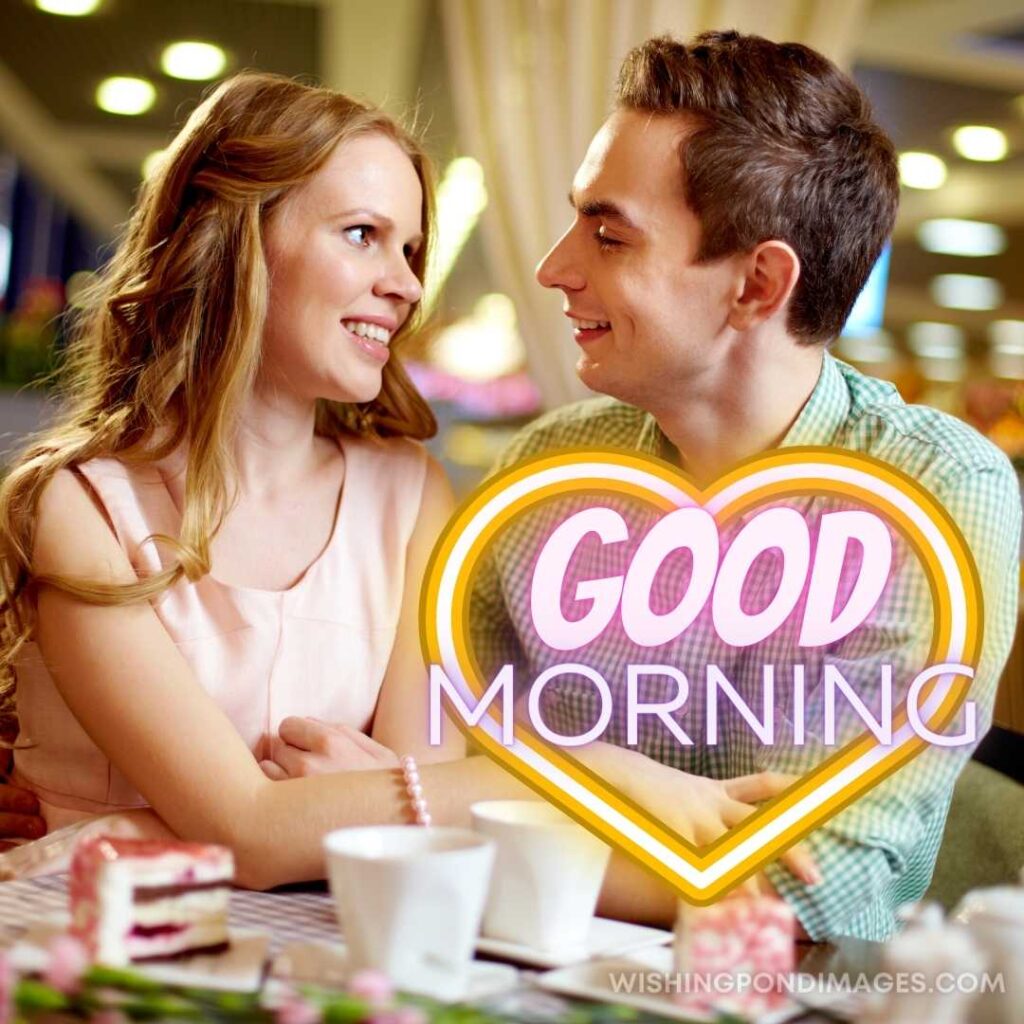 A young couple in a cafe drinking coffee smiling at each other. Good Morning Coffee Images