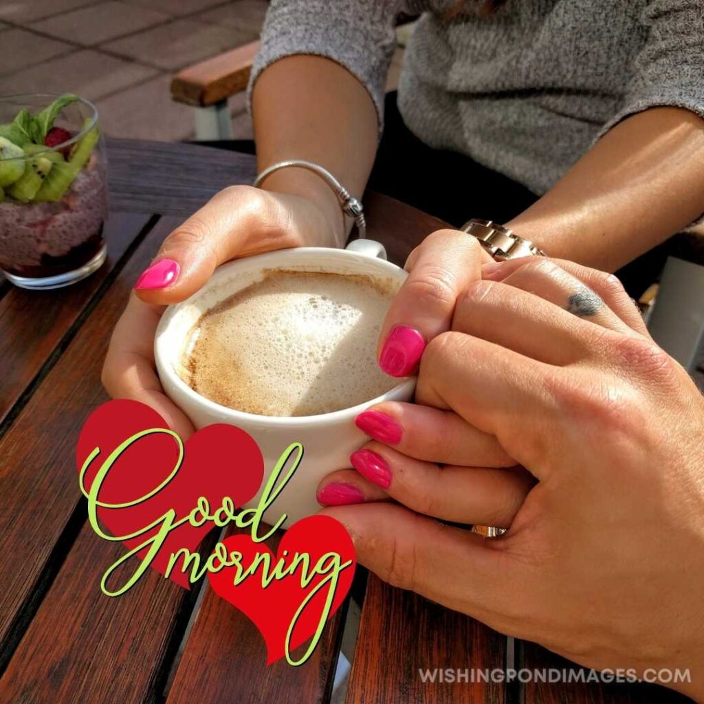 Couple holding hands each other and drinking coffee in a cafe. Good Morning Coffee Images