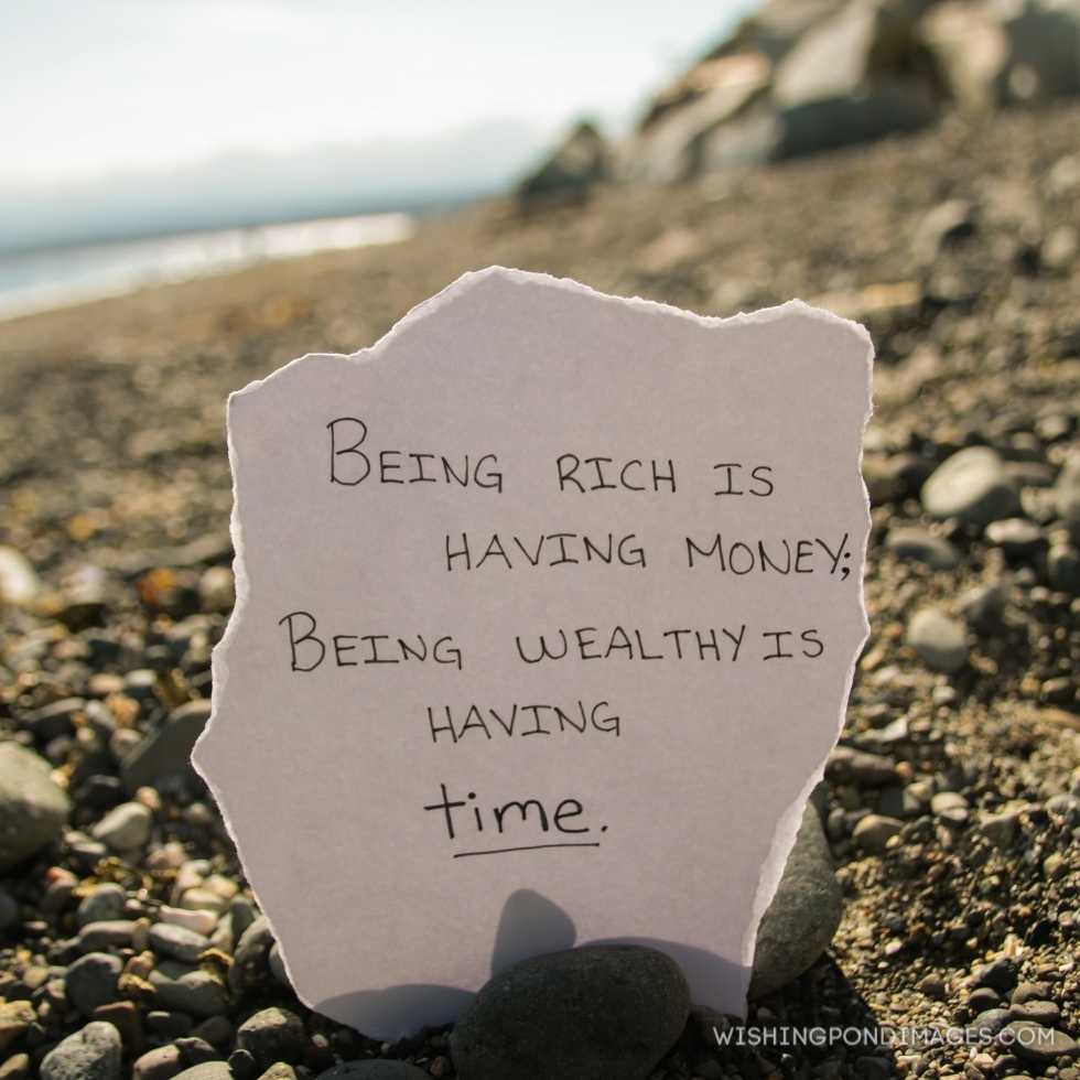 Inspirational quote written on piece of paper, Being rich is having money; Being wealthy is having time. Inspirational quote images