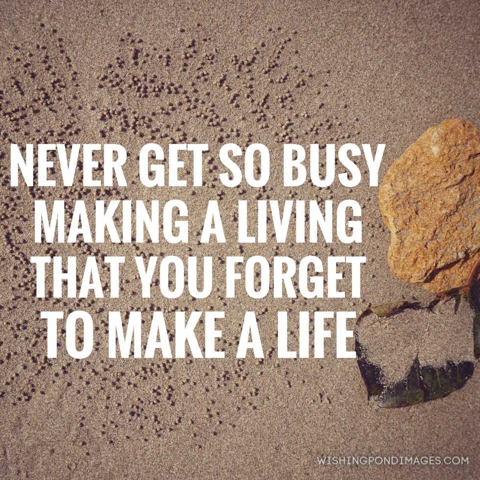 Never get so busy making a living that you forget to make a life' wording on background of beach sand and stone. Inspirational quote images