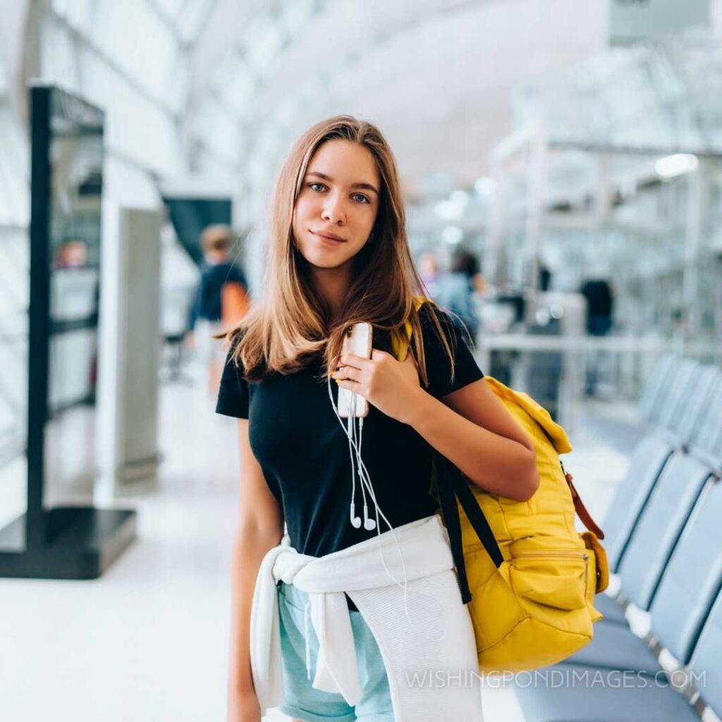 Teen girl waiting in the international airport. Feeling alone images girl