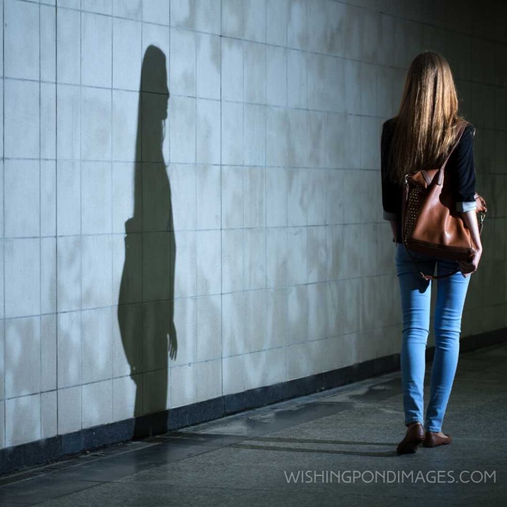 Woman walking alone at night. Feeling alone images girl.