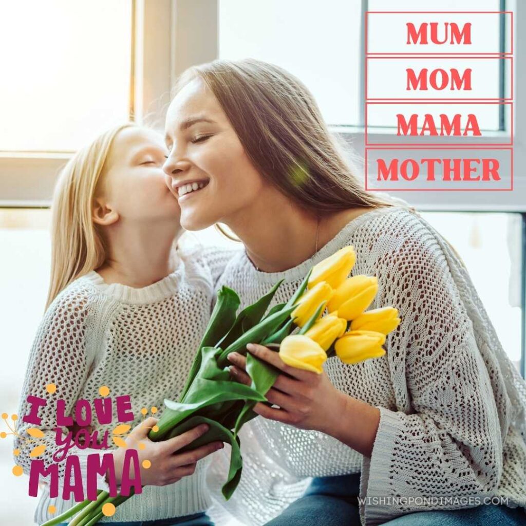 A beautiful little child congratulates her mother and giving a bouquet of flowers to tulips on mother's day. Happy Mothers Day images