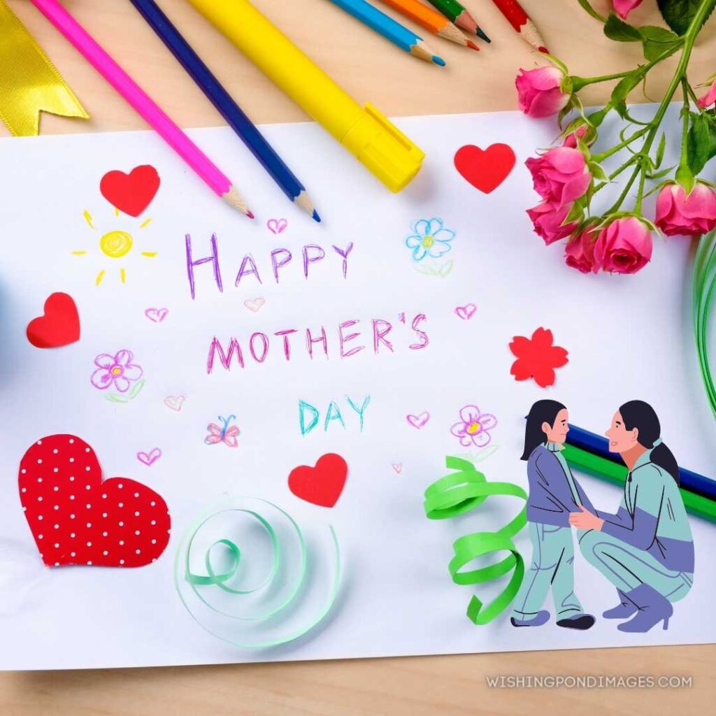 Handmade card with text happy mother's day on wooden table. Happy Mothers Day images