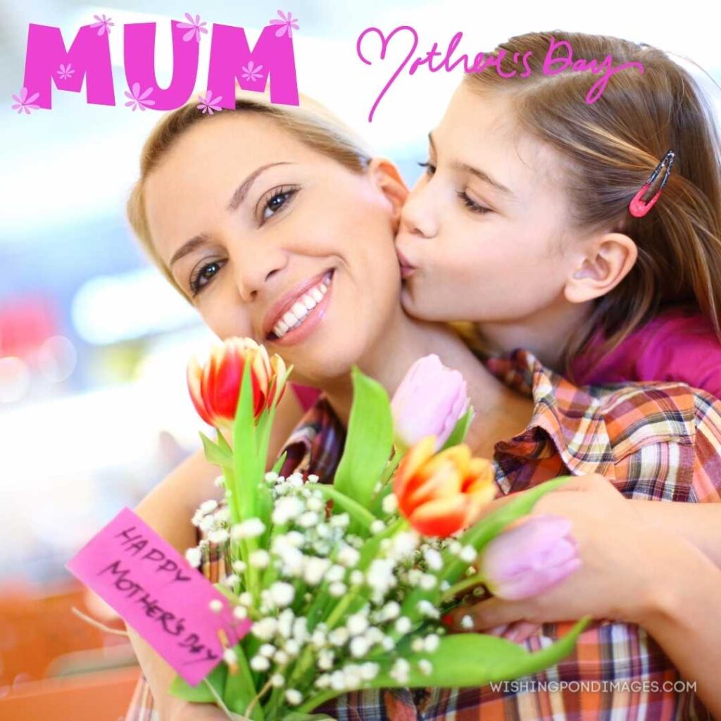 Little girl giving flowers hugging and kissing to her mother on mother's day. Happy Mothers Day images