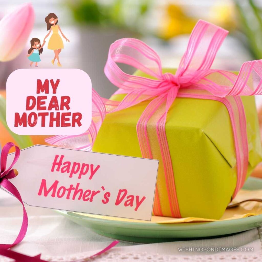 Mothers day card and gift on a prepared table. Happy Mothers Day images