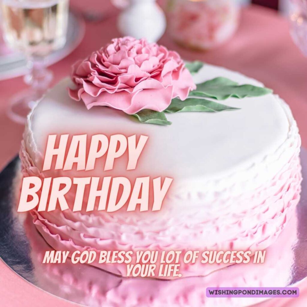 A beautiful cake combination of pink and white color and flowers on top. Happy birthday cake flowers images