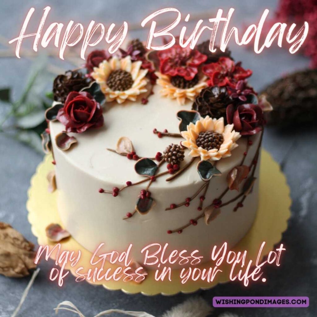 A beautiful cake with autumn flowers on top. Happy birthday cake flowers images