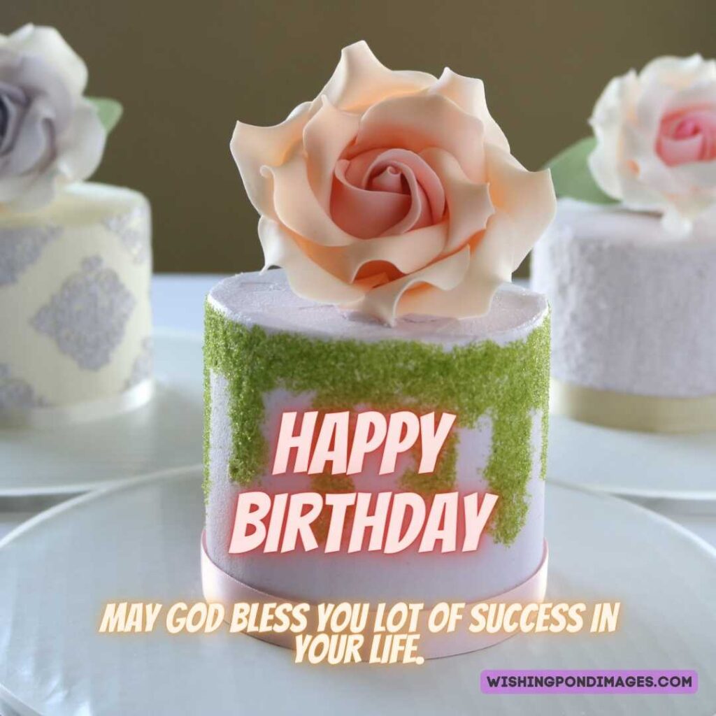 Beautiful cake with a peach-colored flower on top of the cake. Happy birthday cake flowers images